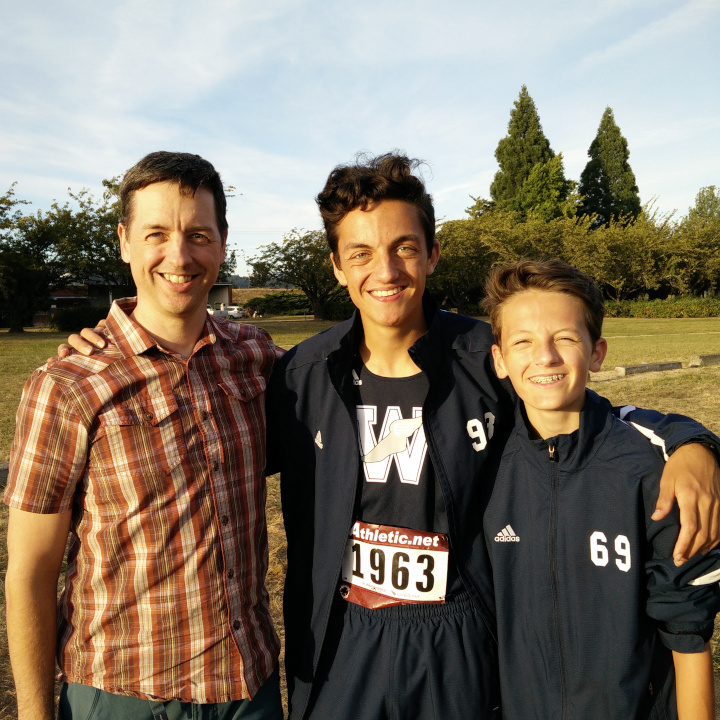 Carl and sons at a cross-country meet